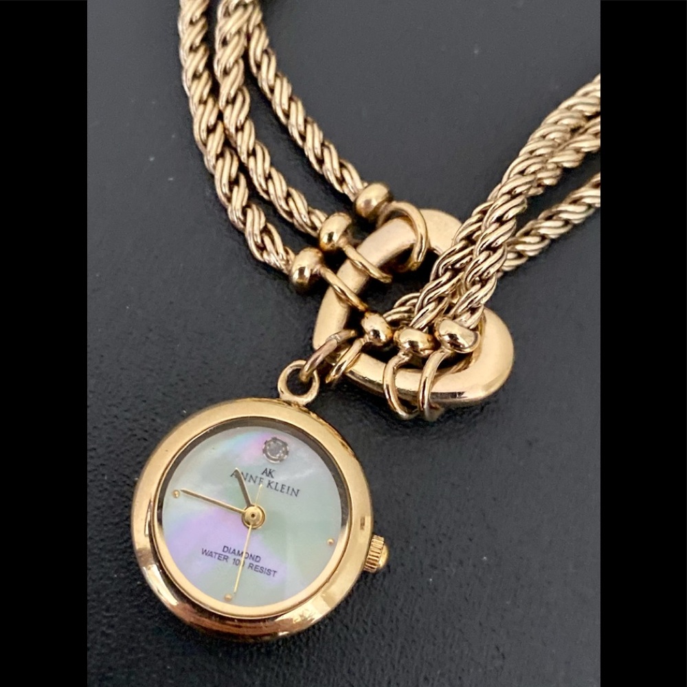 Anne Klein Gold Women's Watch with Mother of Pearl Dial